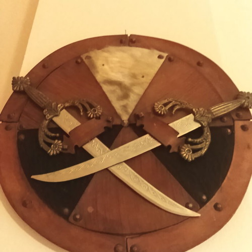 Vintage wall decoration set with swords, shield & leather masks