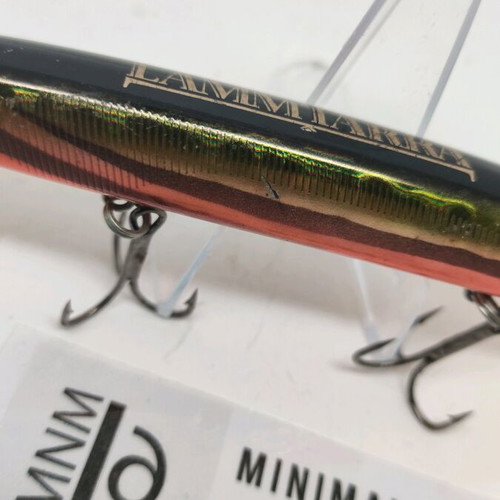 Lammtarra artificial lure used, dark olive with golden green and orange belly