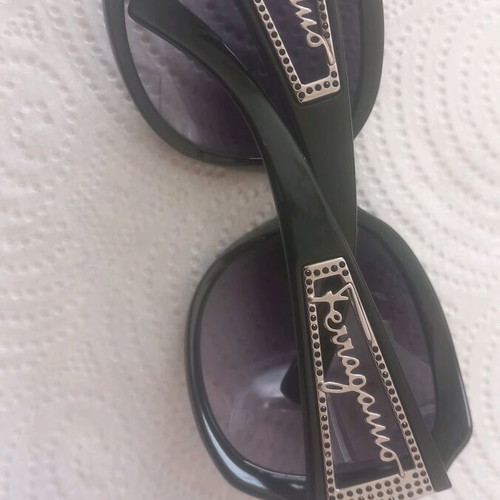 Salvatore Ferragamo sunglasses black like new with zirconia