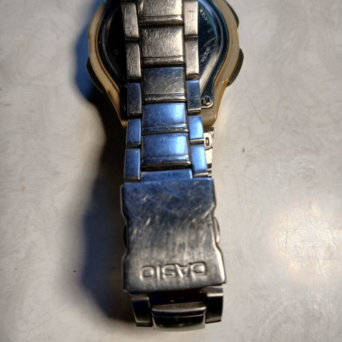 Casio Illuminator wristwatch used, blue and silver, solar battery