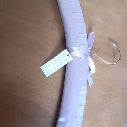 Hanger with padded cover new, color sap green and purple tag