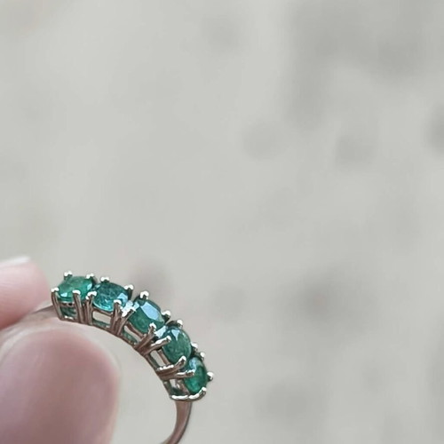 Ring with emeralds in white gold 750, like new