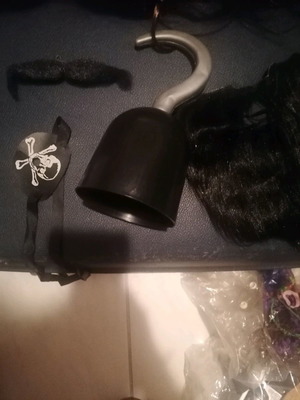 Pirate carnival costume used with bolero, hat, beard, and hook