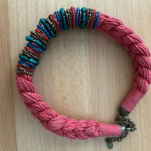 Red braided necklace with multicolored stones used