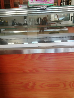 Double-sided glass display case for syrup desserts, shelf for 8 trays