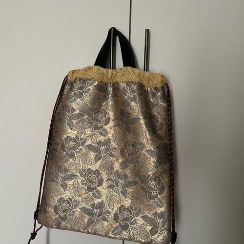 Boho backpack unused, gold shades