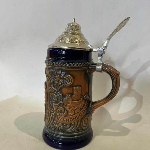 Gerz German beer stein used with embossed designs and pewter lid