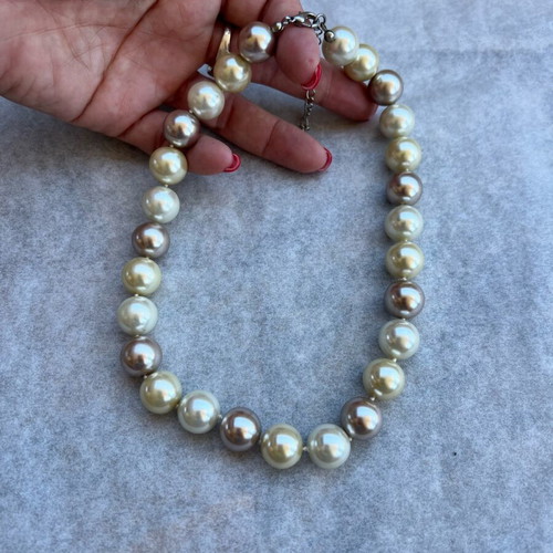 Necklace with large beads in white, gold and bronze shades like new