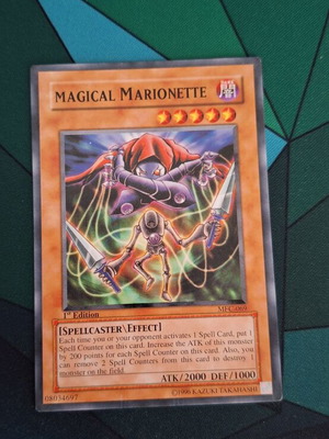 Magical Marionette Yu-Gi-Oh! card near mint, super rare 1st edition