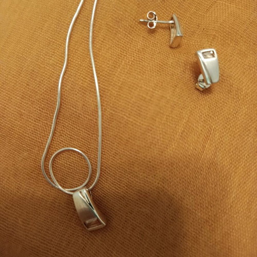 Jewelry set earrings and pendant new with yellow stone