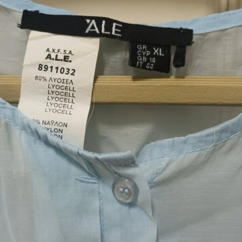 A.L.E. turquoise shirt like new, size XL fits L and M