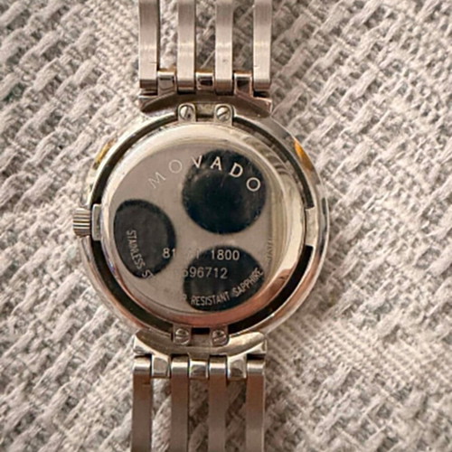 Movado Esperanza ladies watch used, silver-gold tone bracelet, black dial