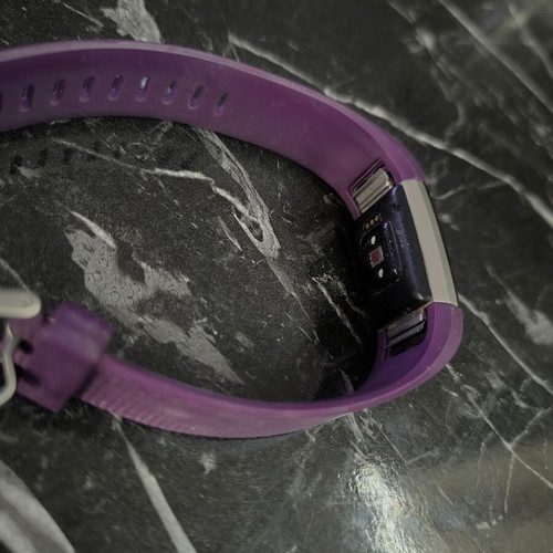 Fitbit Charge 2 smartwatch like new with purple strap and charger