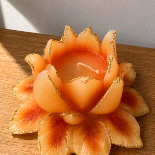 Set of 3 used waterlily decorative candles with gold details