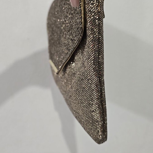 Clutch bag with subtle gold shimmer, like new