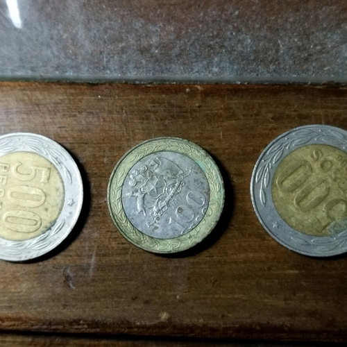 Peso coins used, set of three from Chile
