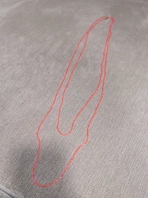 Necklace thin long coral like new
