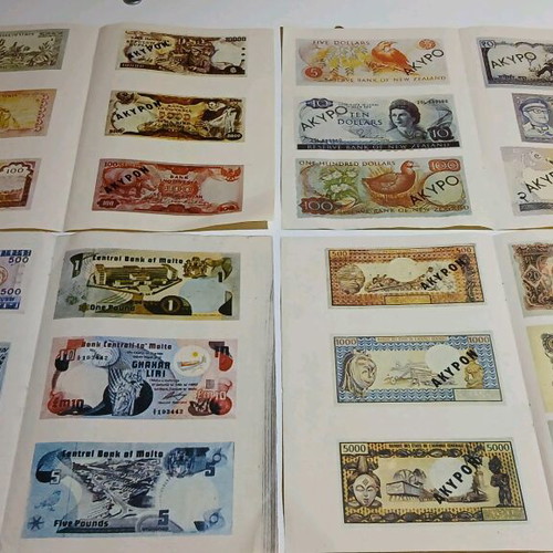 Bleck Paper Cutter with Used Banknotes from Various Countries
