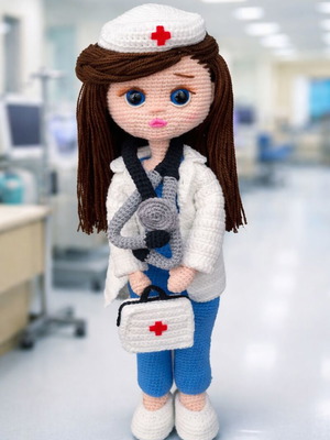 Knitted doctor doll new with medical accessories