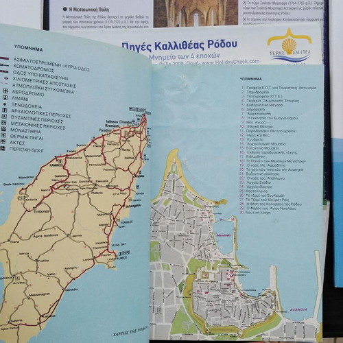 Package of used maps, books and travel brochures for Rhodes and Halki