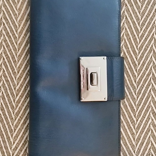Michael Kors blue leather clutch bag like new with silver clasp