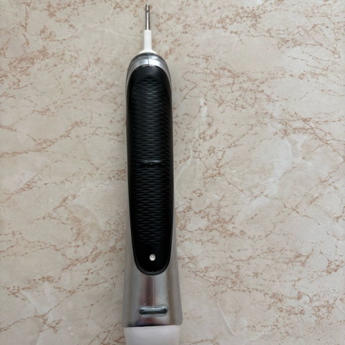 Oral-B Triumph IQ 5000 electric toothbrush used