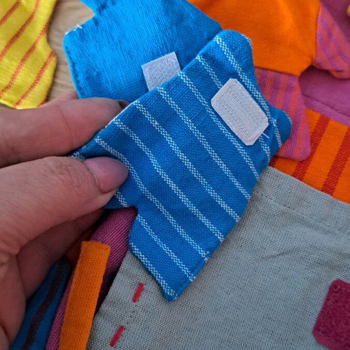 Cloth bag with doll and clothes used