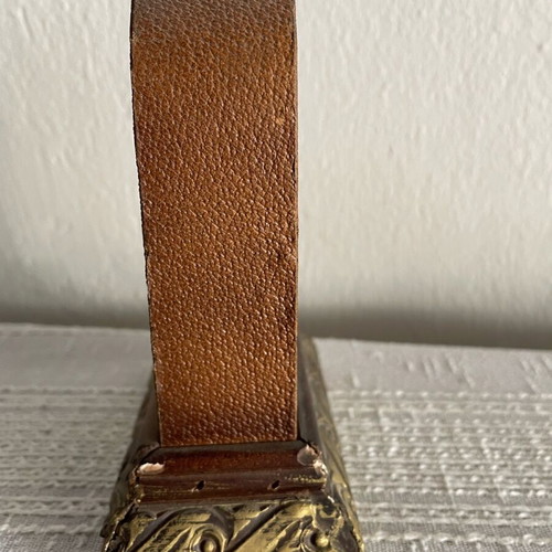 Vintage tabletop clock used, leather and carved wood