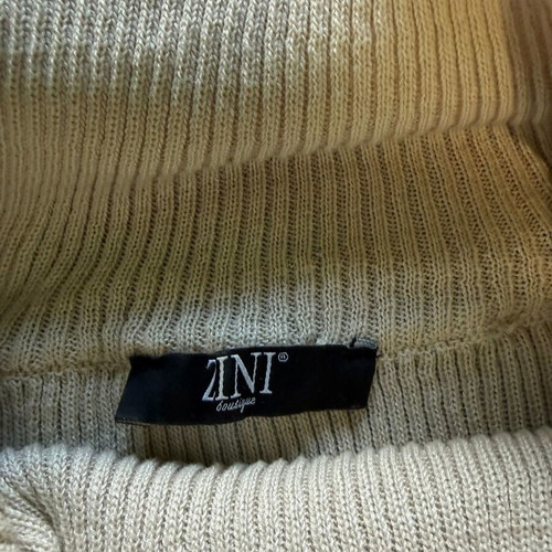 Zini sweater with high turned collar in cream color like new