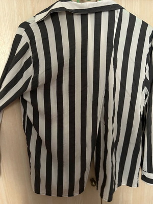 Shirt used with stripes and back opening