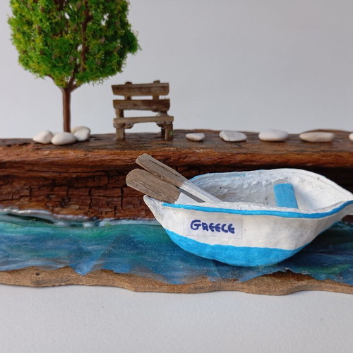 Handmade sea-themed driftwood diorama with Greek island house