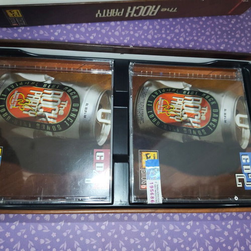 The Rock Party Compact Disc Club set like new, 4 CDs