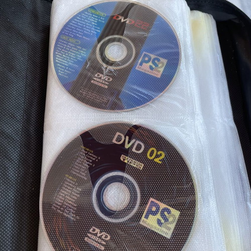 Vintage PC and PlayStation 2 gaming bundle with case, 70 CDs/DVDs