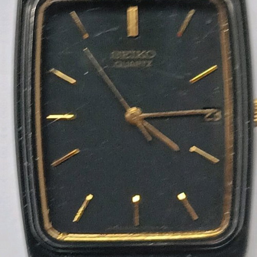 Seiko 2A32-5059 wristwatch used with black bracelet