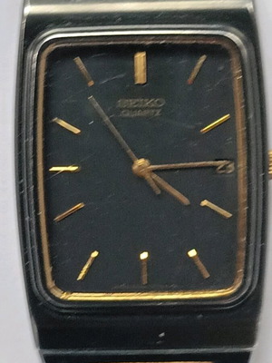 Seiko 2A32-5059 wristwatch used with black bracelet