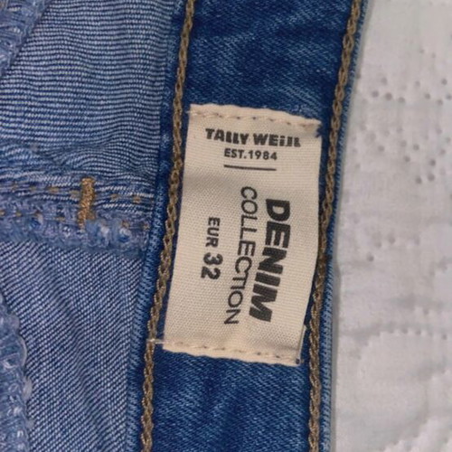 Kids' blue denim shorts used with pockets