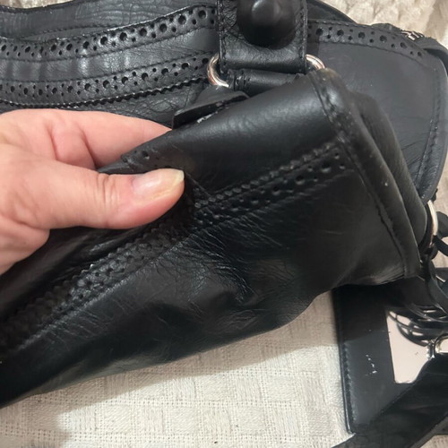 Balenciaga handbag used with long shoulder strap and company mirror