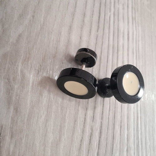 Barbell piercing earrings used, black and white, bar style