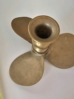 Bronze candlestick with propeller-shaped base like new