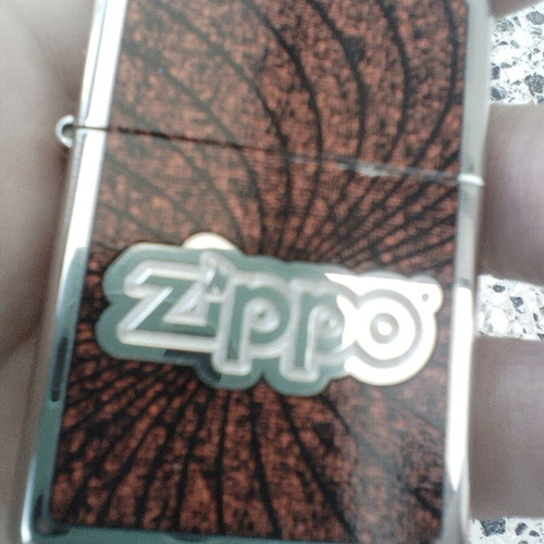 Zippo 2011 lighter with embossed design