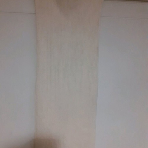 Long skirt like new, ecru knit fabric with side slit and drawstring