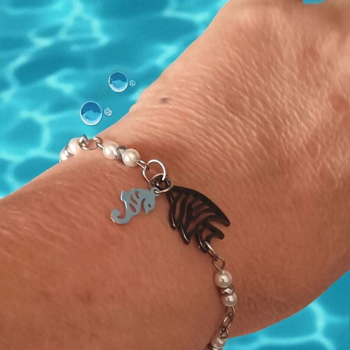 Handmade rosary bracelet with white pearls, hematite and steel elements