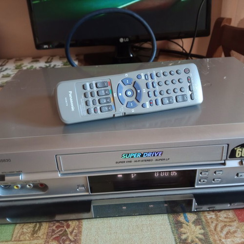 Panasonic NV830 Super VHS player used with remote control