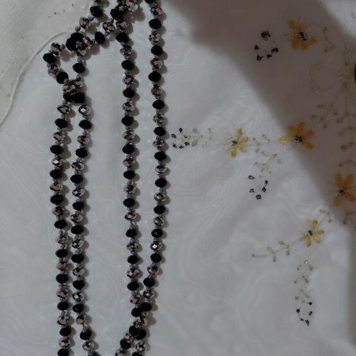 Necklace with shiny beads like new, black and silver