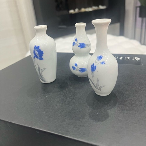 Miniature ceramic set of three vases like new