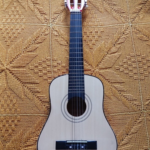 Children's classical guitar used with nylon strings