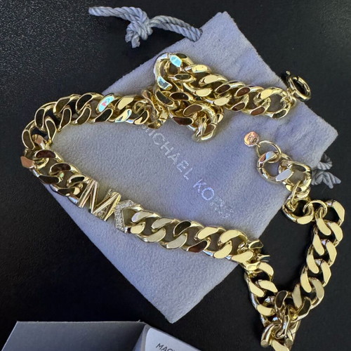 Michael Kors necklace new, gold plated with zircon