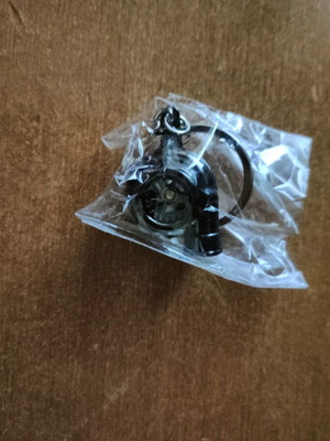 Keychain new turbo-shaped black