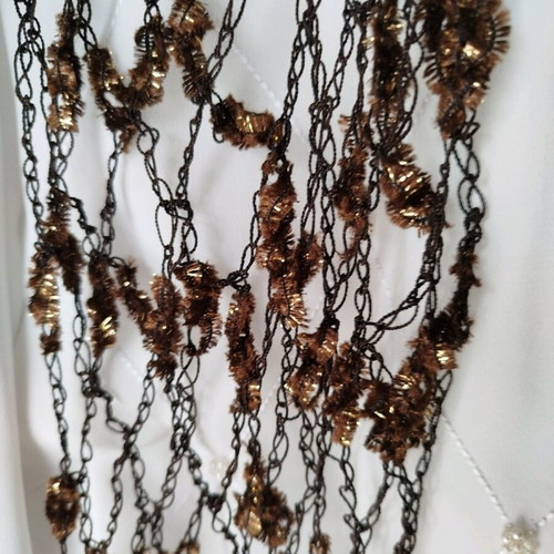 Crocheted spring scarf new, brown gold