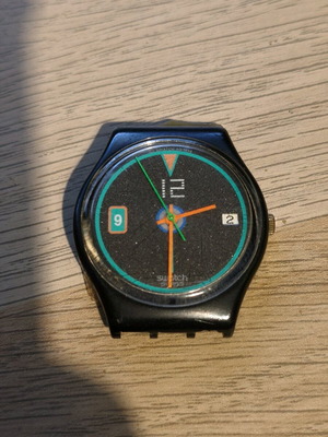 Swatch retro watch used with vintage design without strap